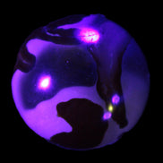 Marine Jasper sphere 45mm 126g Rocks and Things Store in UV light