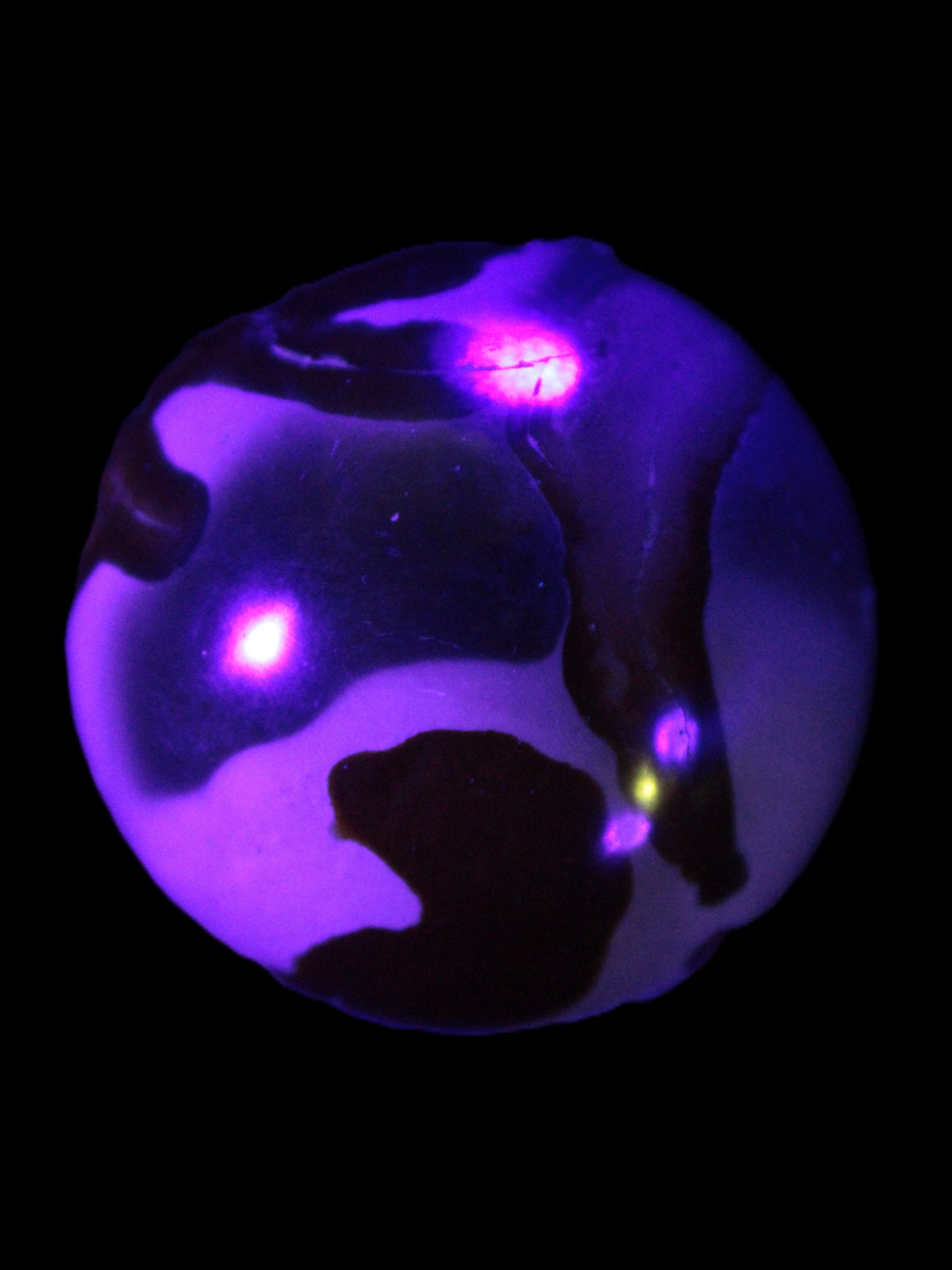 Marine Jasper sphere 45mm 126g Rocks and Things Store in UV light