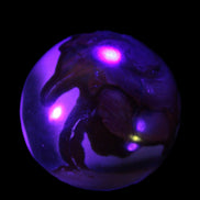 Marine Jasper sphere 45mm 126g Rocks and Things Store in UV light