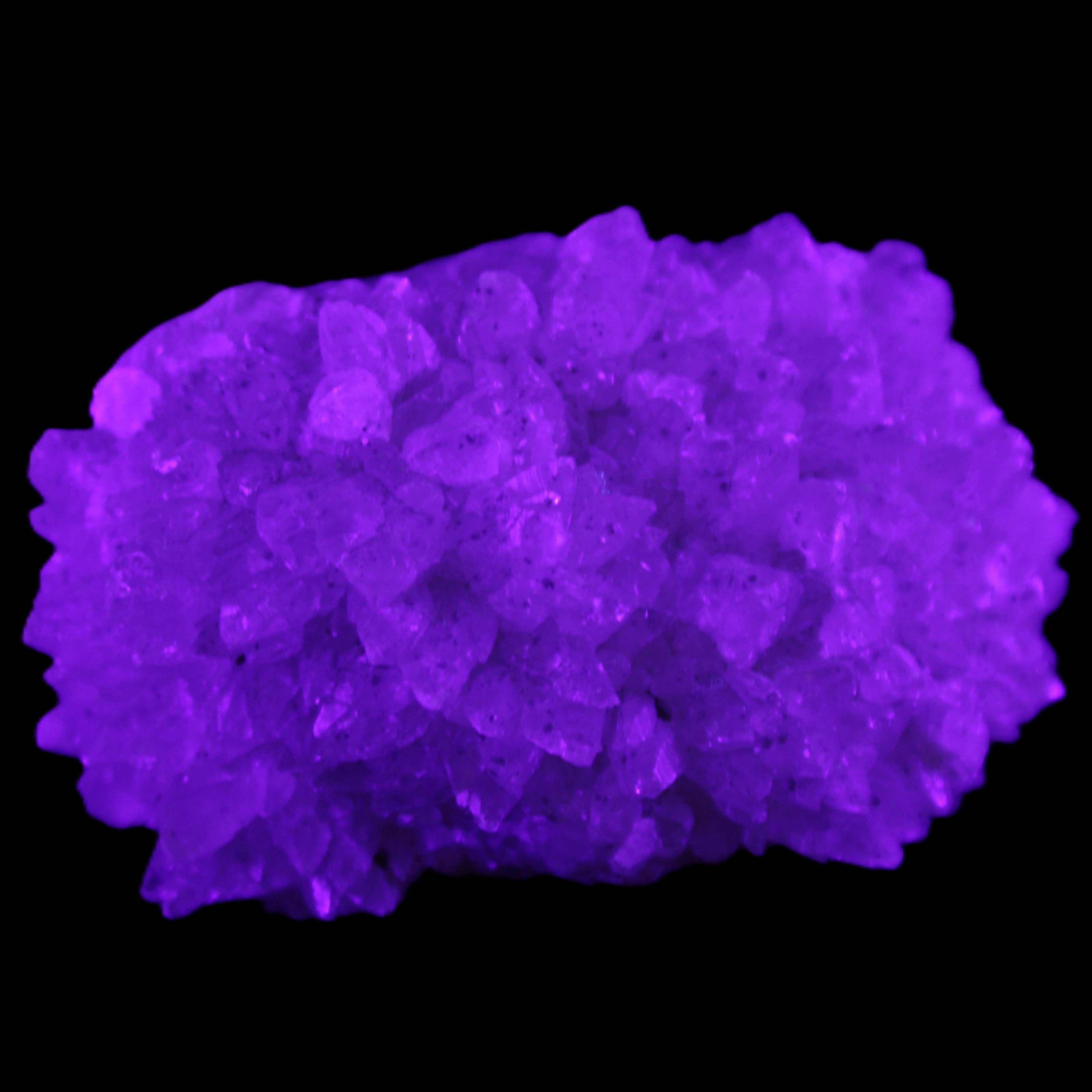 Clear Quartz cluster 75*60*42mm 218g in UV light - Rocks and Things Store