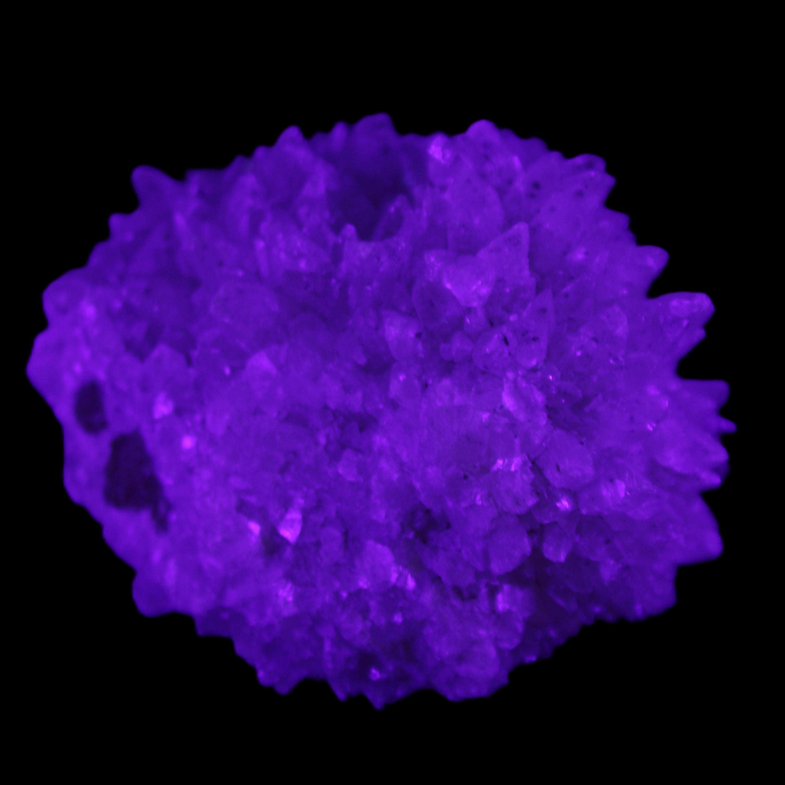 Clear Quartz cluster 75*60*42mm 218g in UV light - Rocks and Things Store
