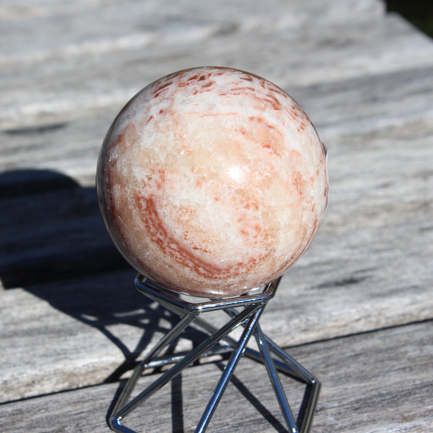 Rhodochrosite sphere 287g Rocks and Things