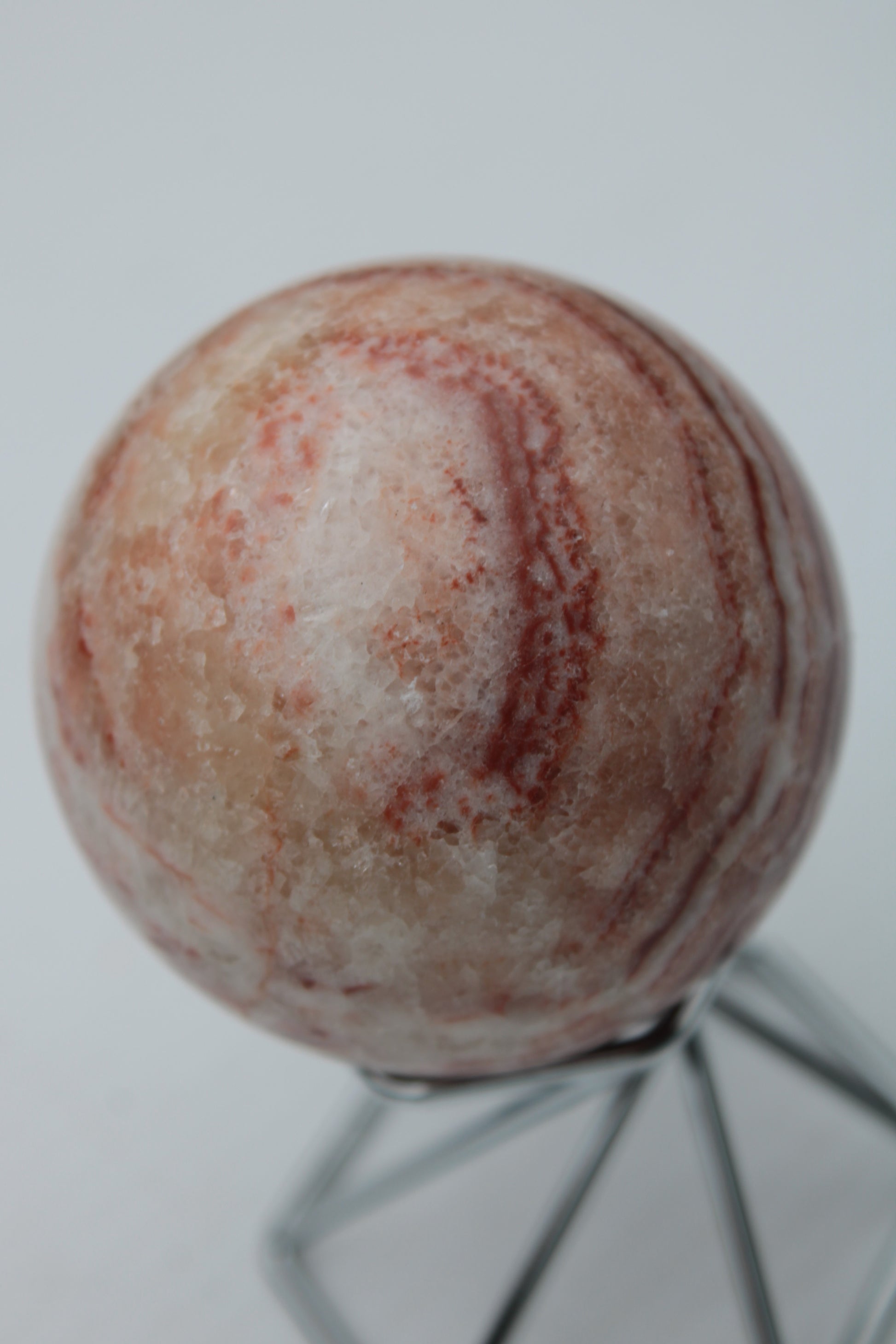 Rhodochrosite sphere 287g Rocks and Things