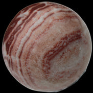 Rhodochrosite sphere 287g in sunlight - Rocks and Things Store