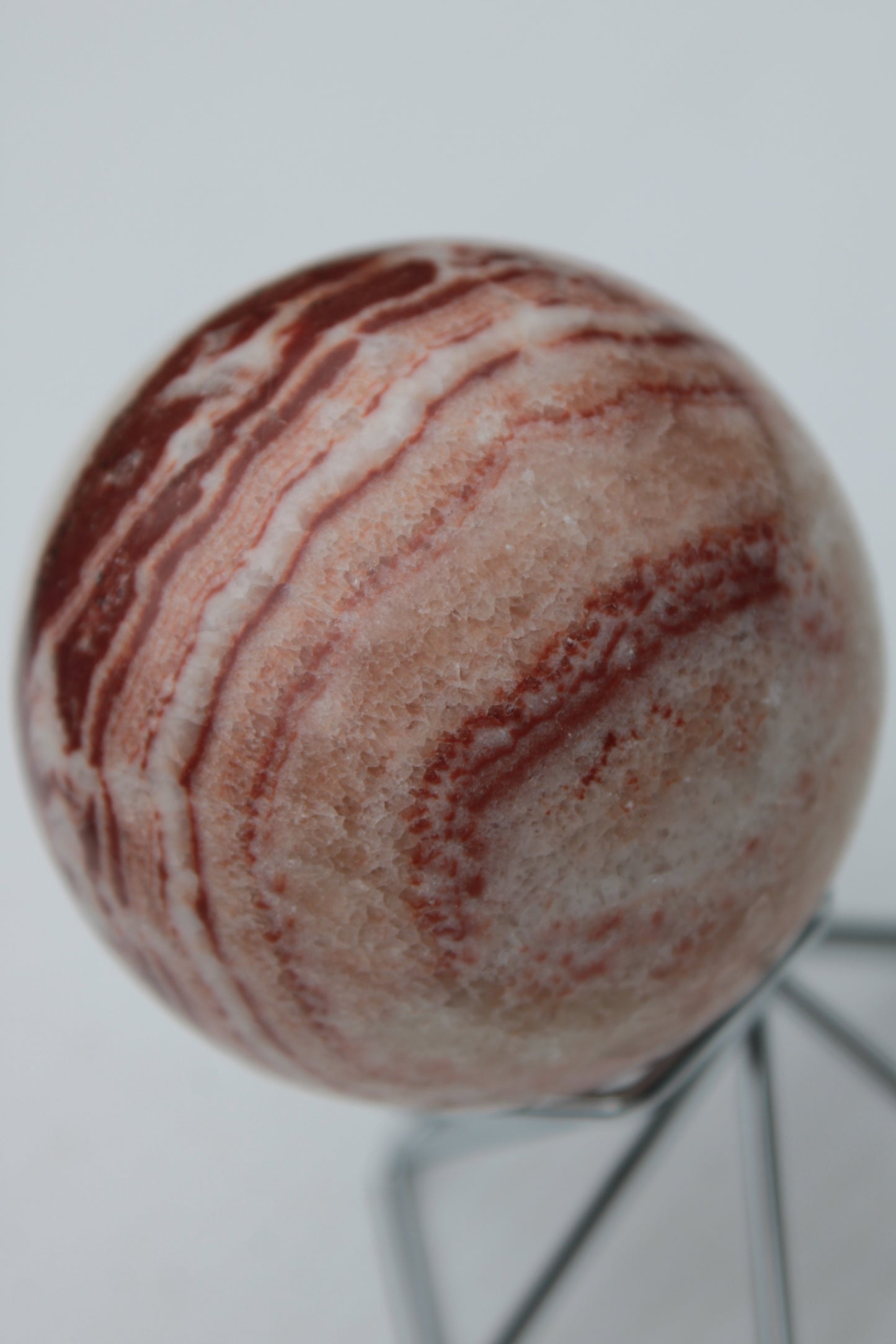 Rhodochrosite sphere 287g Rocks and Things