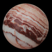 Rhodochrosite sphere 287g in sunlight - Rocks and Things Store