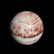 Rhodochrosite sphere 287g in sunlight - Rocks and Things Store