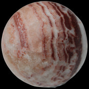 Rhodochrosite sphere 287g in sunlight - Rocks and Things Store