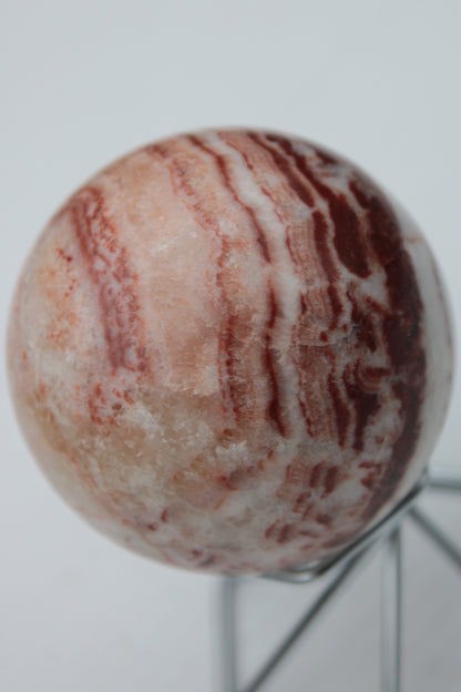 Rhodochrosite sphere 287g Rocks and Things