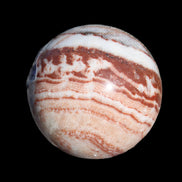 Rhodochrosite sphere 287g in sunlight - Rocks and Things Store