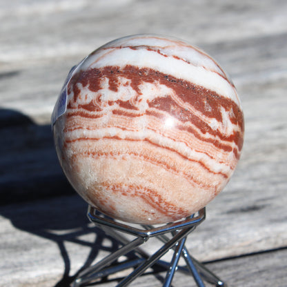 Rhodochrosite sphere 287g Rocks and Things