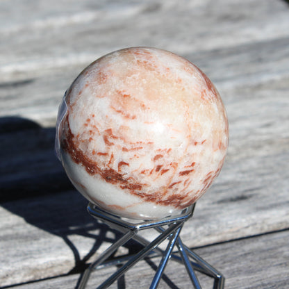 Rhodochrosite sphere 287g Rocks and Things