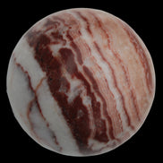 Rhodochrosite sphere 287g in sunlight - Rocks and Things Store