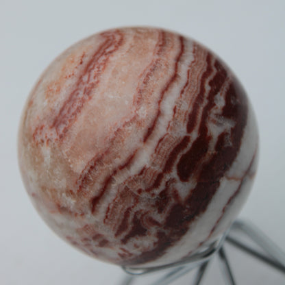 Rhodochrosite sphere 287g Rocks and Things