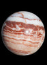 Rhodochrosite sphere 287g in sunlight - Rocks and Things Store