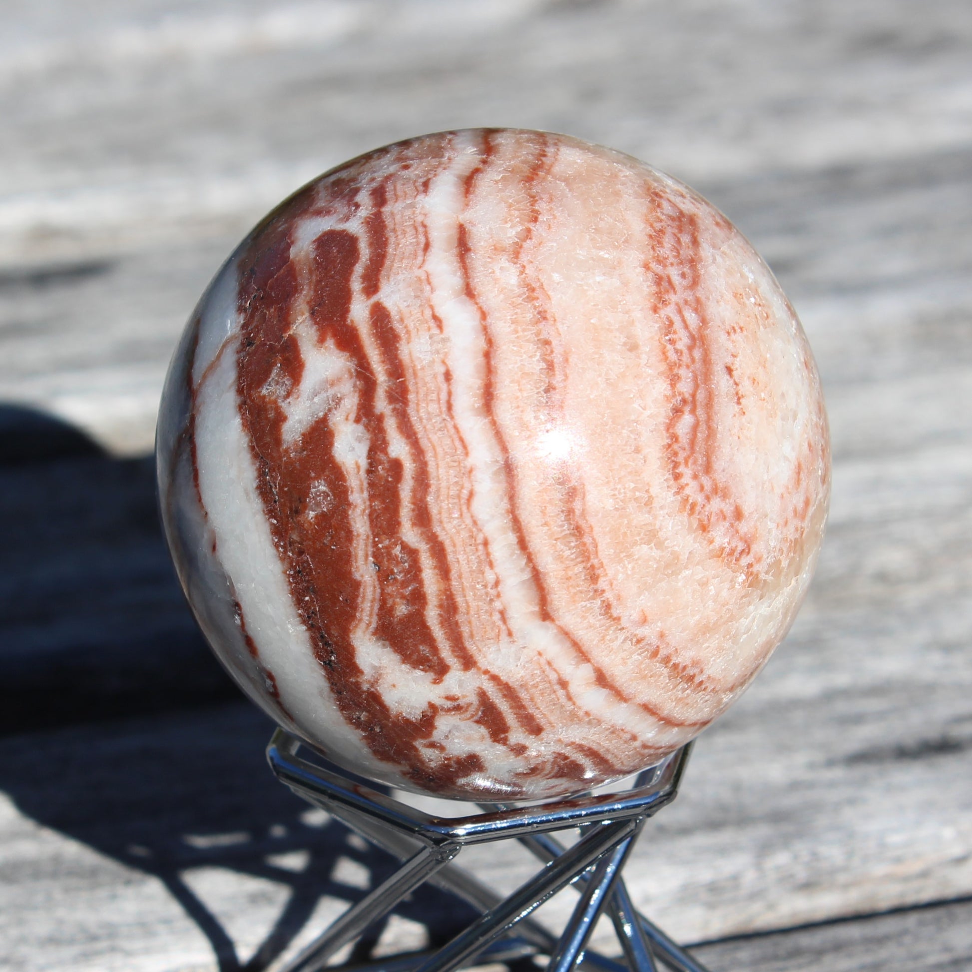 Rhodochrosite sphere 287g Rocks and Things