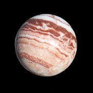 Rhodochrosite sphere 287g in sunlight - Rocks and Things Store