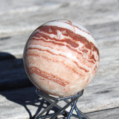 Rhodochrosite sphere 287g Rocks and Things