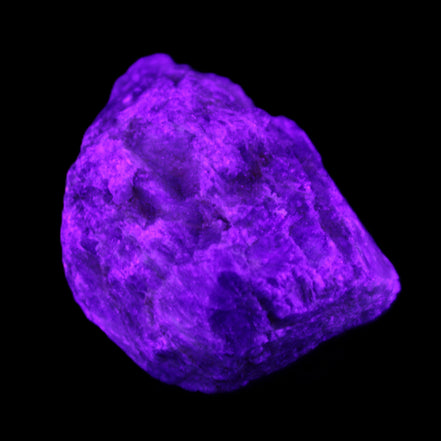 Blue Sapphire (unheated) 69g in UV light - Rocks and Things Store