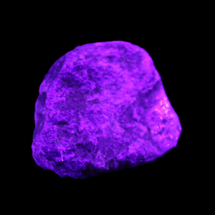 Blue Sapphire (unheated) 69g in UV light - Rocks and Things Store