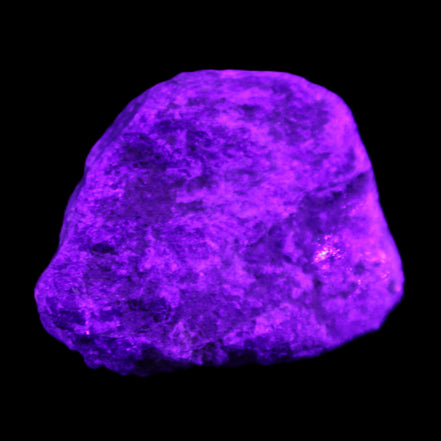 Blue Sapphire (unheated) 69g in UV light - Rocks and Things Store