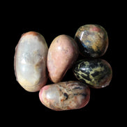 Rhodonite 4/5 tiny tumbled stone 12-19g in sunlight - Rocks and Things Store
