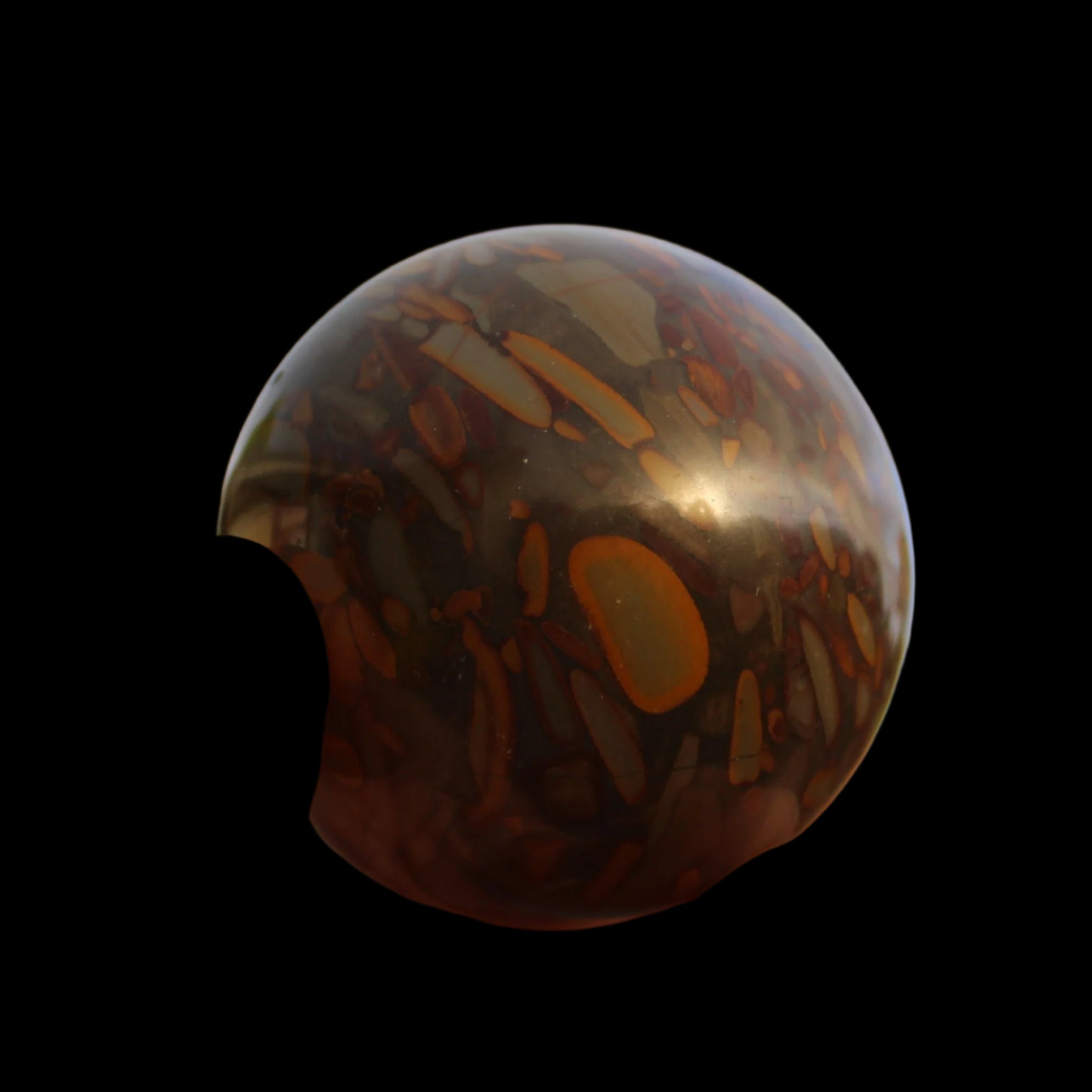 Bamboo Leaf Jasper sphere 175g in sunshine with shadows from holding fingers - Rocks and Things Store
