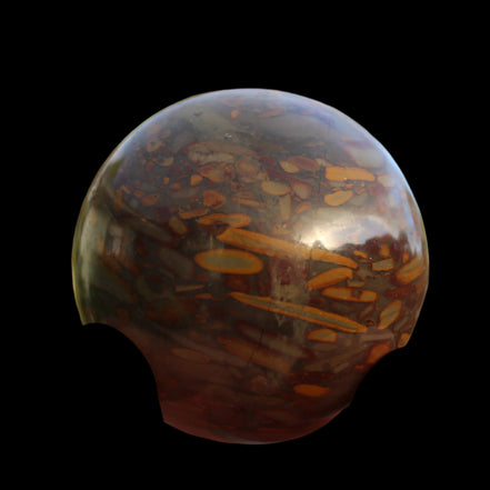 Bamboo Leaf Jasper sphere 175g in sunshine with shadows from holding fingers - Rocks and Things Store
