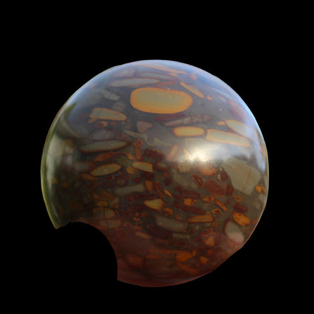 Bamboo Leaf Jasper sphere 175g in sunshine with shadows from holding fingers - Rocks and Things Store