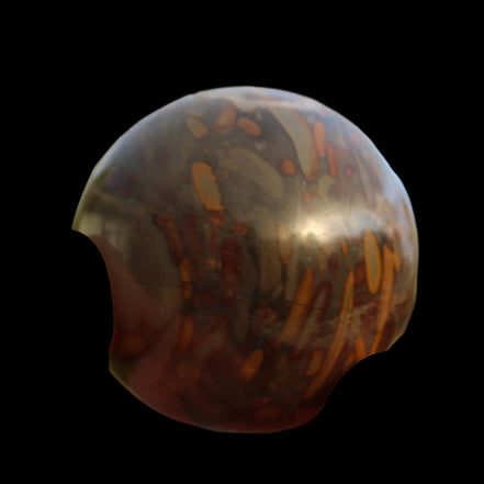 Bamboo Leaf Jasper sphere 175g in sunshine with shadows from holding fingers - Rocks and Things Store