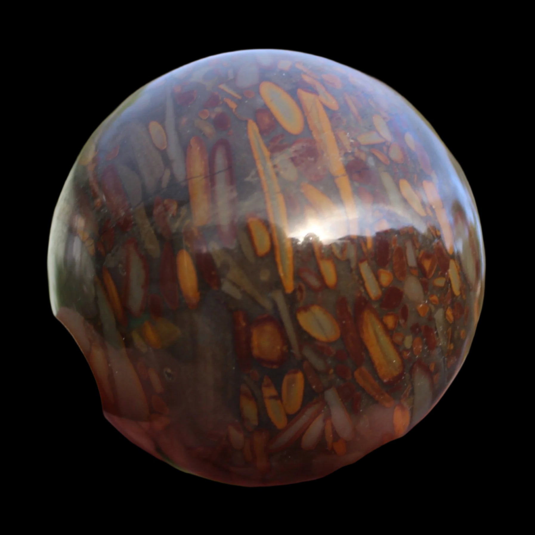 Bamboo Leaf Jasper sphere 175g in sunshine with shadows from holding fingers - Rocks and Things Store