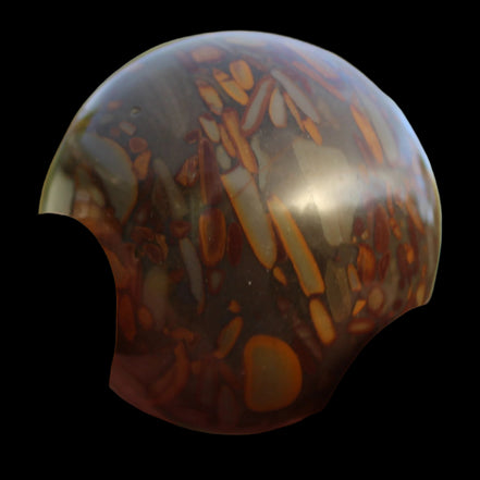 Bamboo Leaf Jasper sphere 175g in sunshine with shadows from holding fingers - Rocks and Things Store