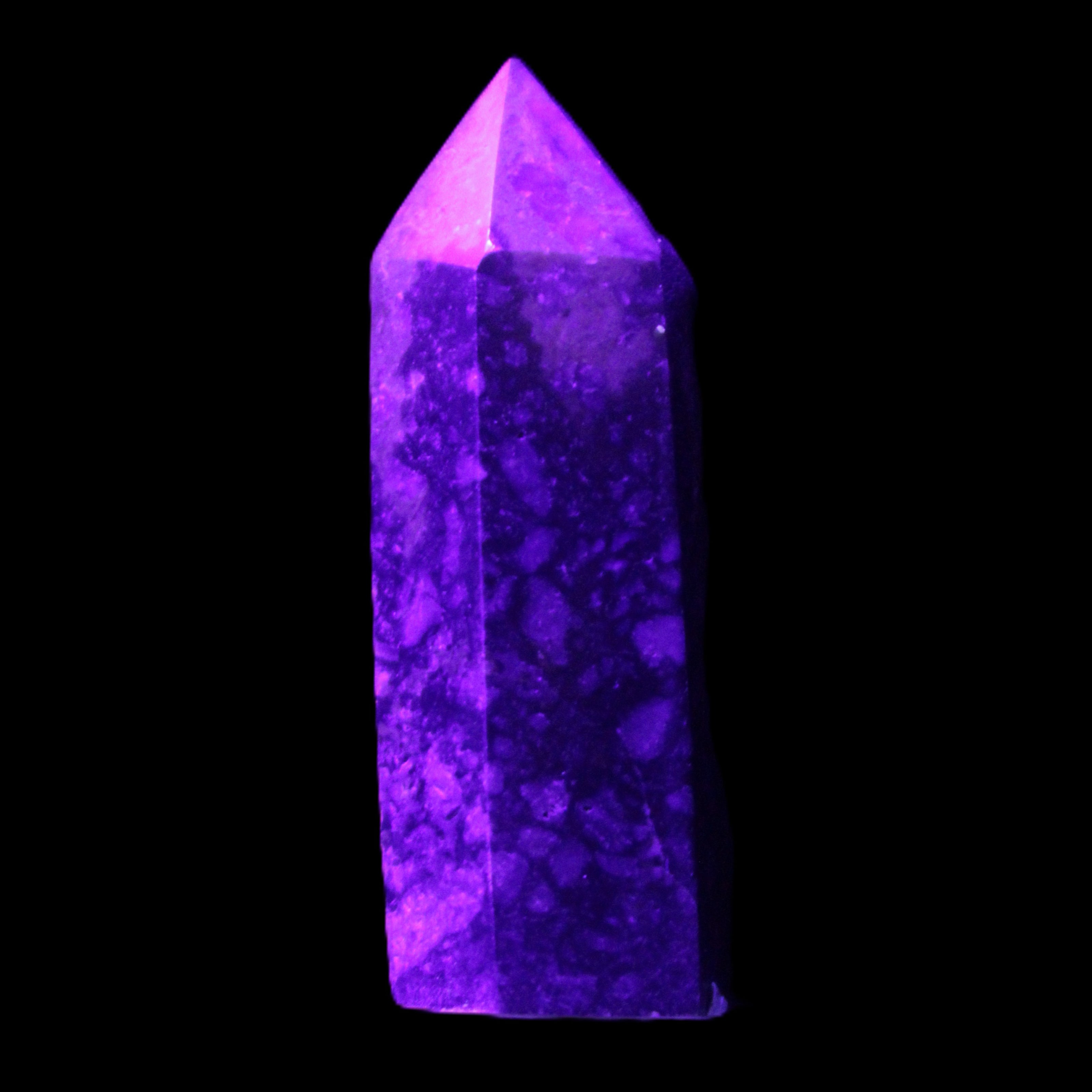 Sugilite wand 41g in UV light - Rocks and Things Store