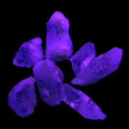 Lepidocrosite Fire Quartz from Namibia 5/6 crystals 5-7g in UV light - Rocks and Things Store
