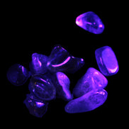 Auralite tiny tumbled crystals from Morocco 8-10g in UV light - Rocks and Things Store