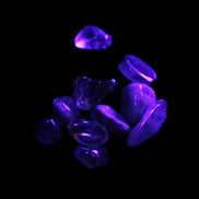 Auralite tiny tumbled crystals from Morocco 8-10g in UV light - Rocks and Things Store