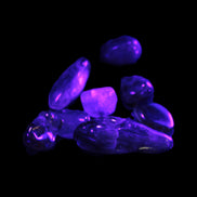 Auralite tiny tumbled crystals from Morocco 8-10g in UV light - Rocks and Things Store