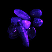 Auralite tiny tumbled crystals from Morocco 8-10g in UV light - Rocks and Things Store