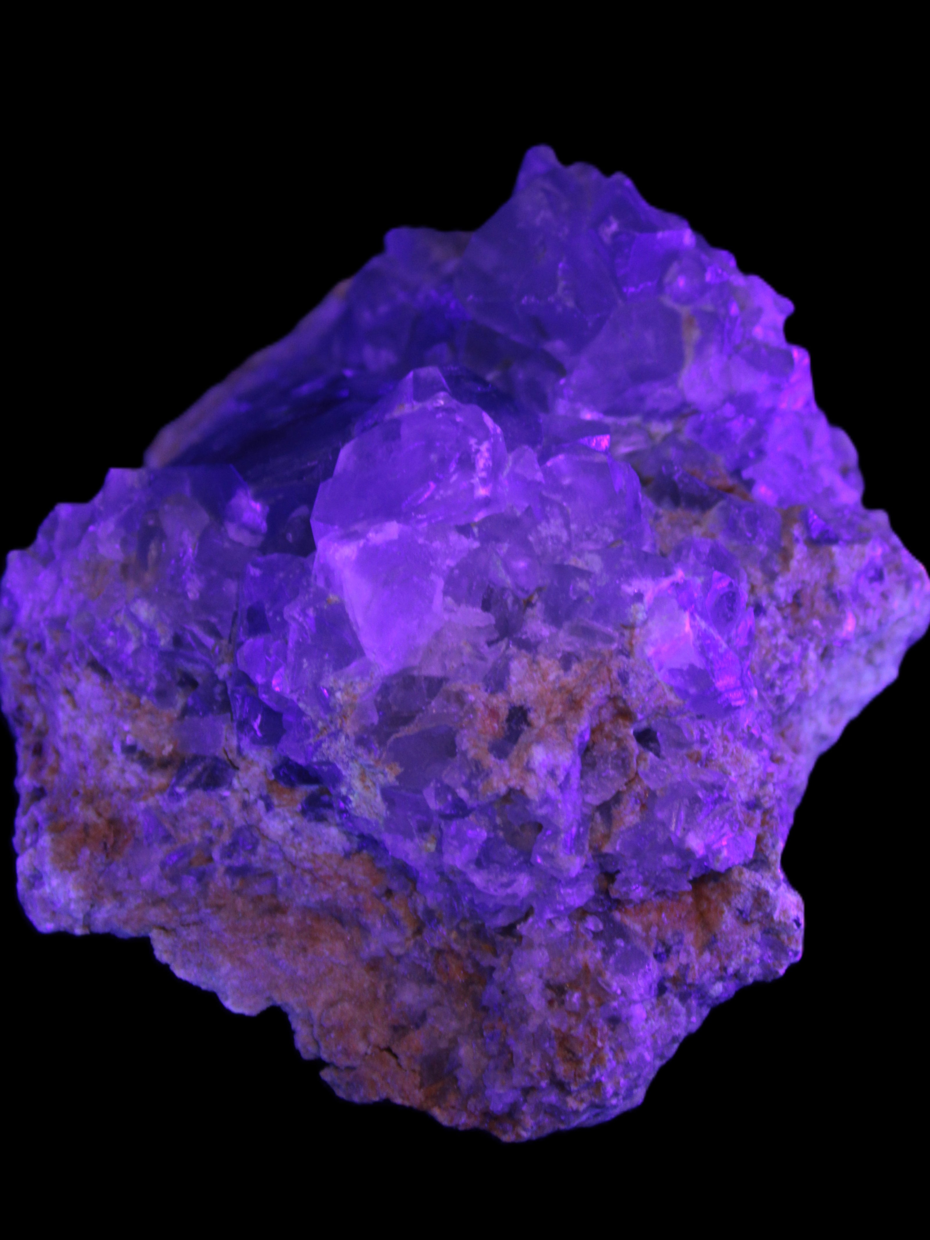 Celestite geode 623g in UV light