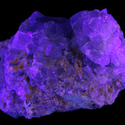 Celestite geode 623g in UV light