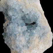 Celestite geode cluster 3840g in sunlight - Rocks and Things Store