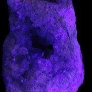 Celestite geode cluster 3840g in UV light - Rocks and Things Store