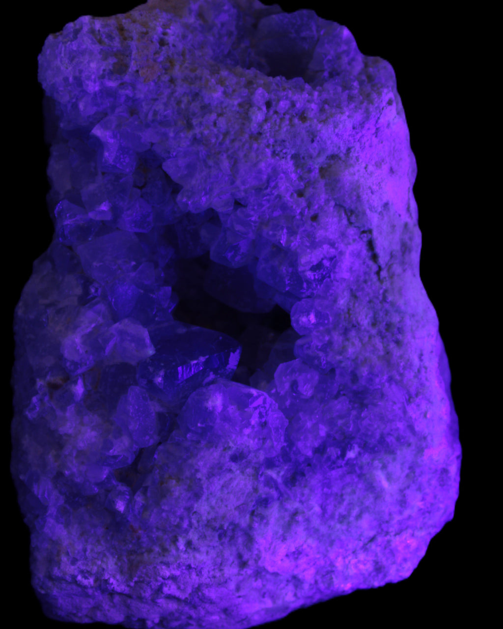 Celestite geode cluster 3840g in UV light