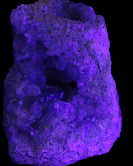 Celestite geode cluster 3840g in UV light - Rocks and Things Store