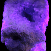 Celestite geode cluster 3840g in UV light