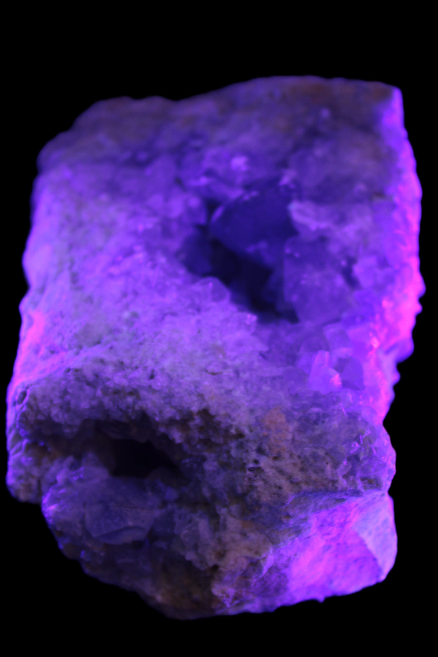 Celestite geode cluster 3840g in UV light