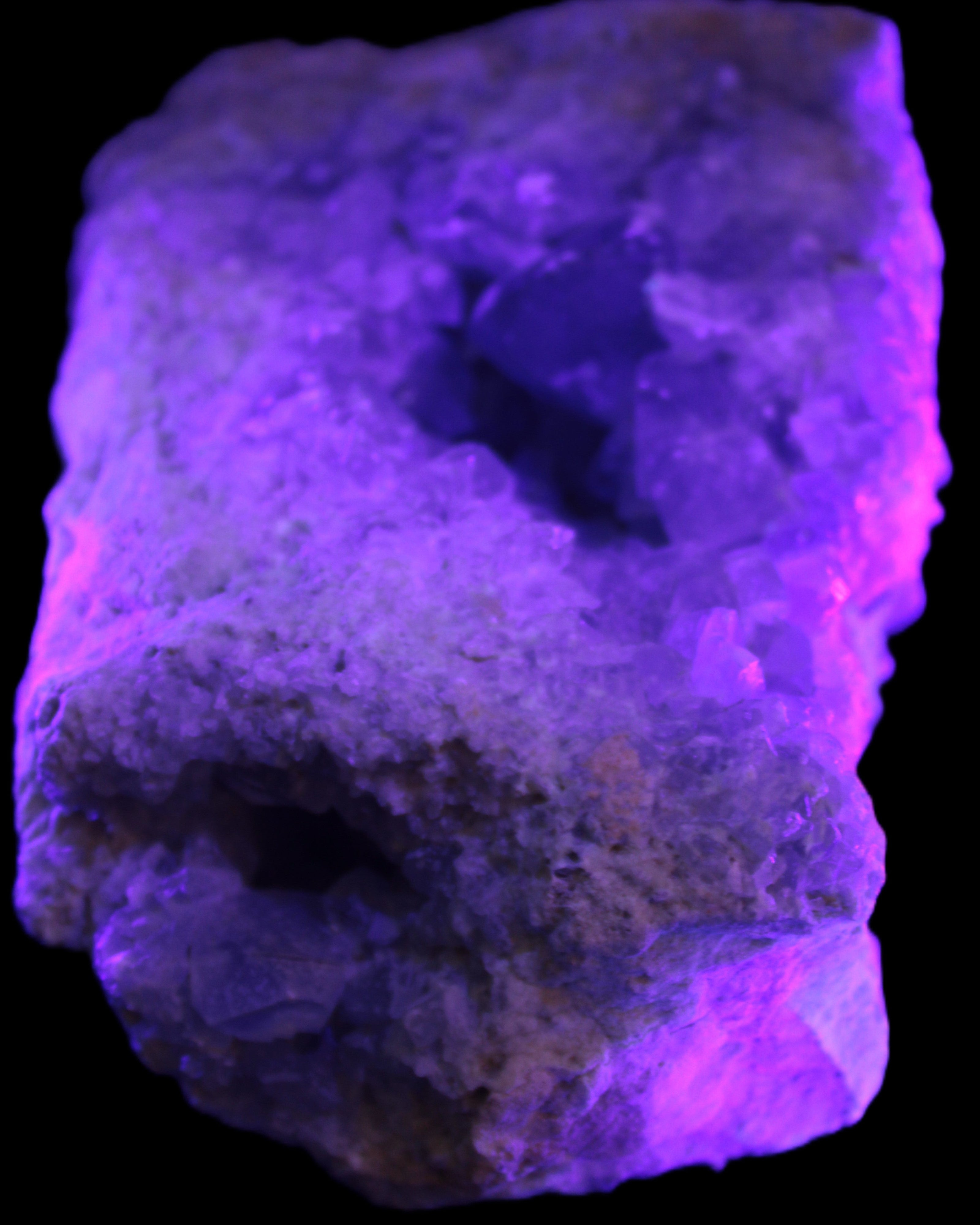 Celestite geode cluster 3840g in UV light