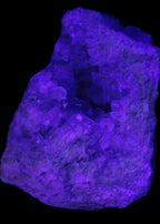 Celestite geode cluster 3840g in UV light