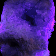 Celestite geode cluster 3840g in UV light