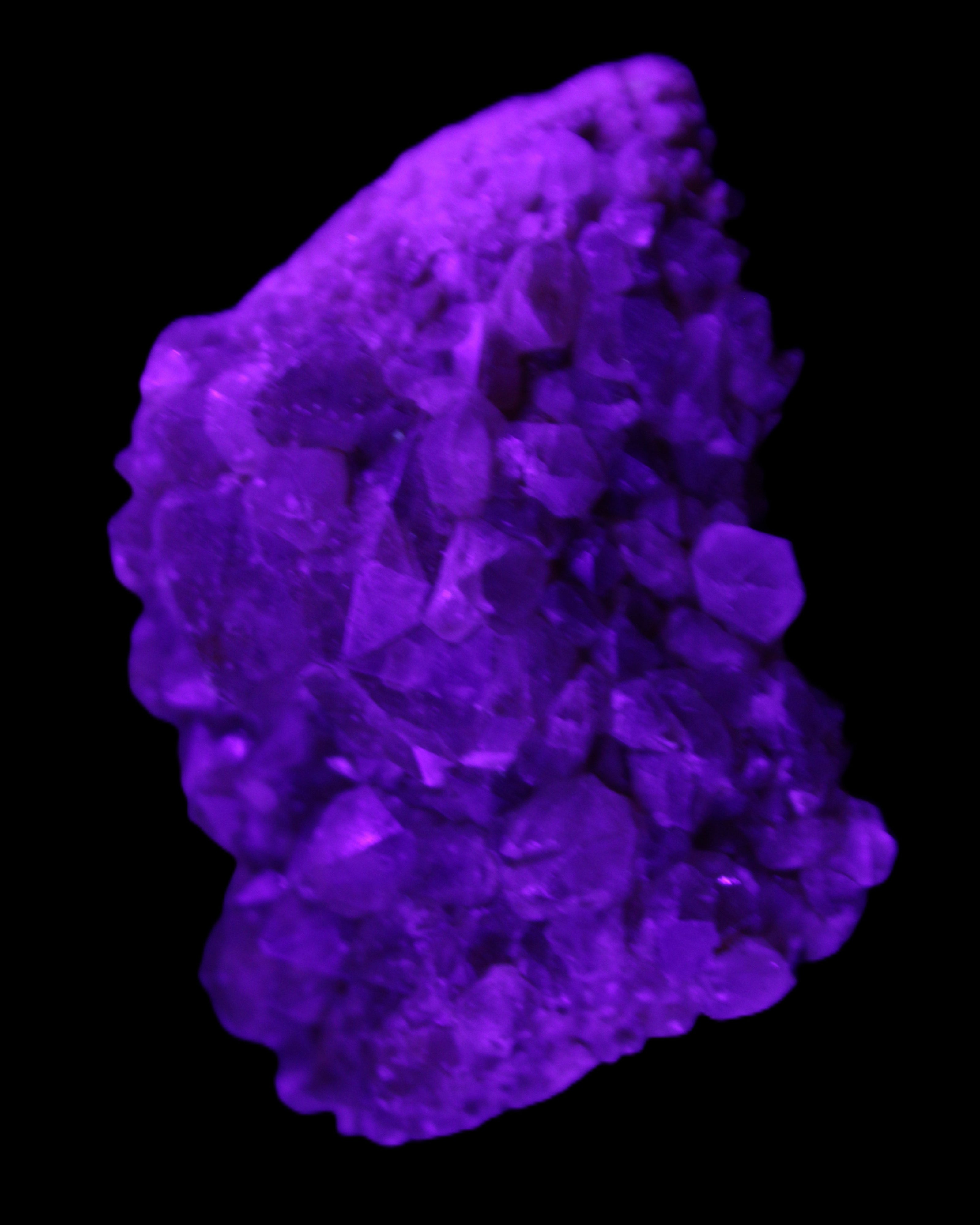 Super Seven Amethyst cluster 99g in UV light - Rocks and Things Store